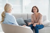 Fototapeta  - Woman talking to therapist