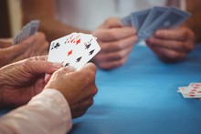 Retired People Playing Card