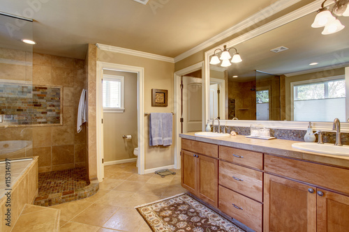 Classic American Bathroom With Wooden Cabinets Two White Sinks