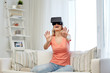 © Syda Productions - woman in virtual reality headset or 3d glasses