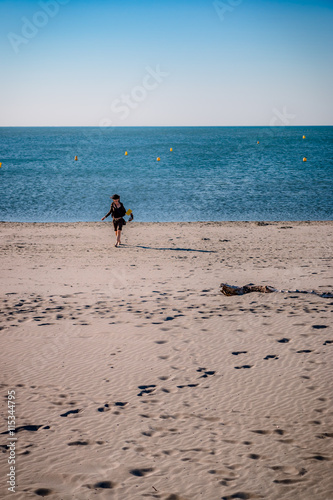 Femme Sur La Plage Des Saintes Maries De La Mer Buy This