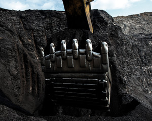 Wall Mural - Excavator at work in open pit