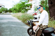 © ADDICTIVE STOCK - Senior Hipster Man on a Motorbike