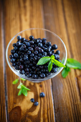 Wall Mural - sweet ripe blueberries in a glass