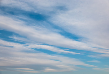 Wall Mural - abstract background with bokeh defocused beautiful flame clouds in the sky