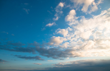 Wall Mural - abstract background with bokeh defocused beautiful flame clouds in the sky