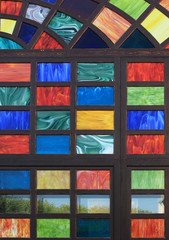 Texture of the old multi-colored stained-glass windows, backgrou