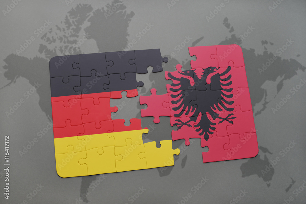 puzzle with the national flag of germany and albania on a world map ...