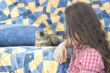 Canvas Print - Girl and kitten