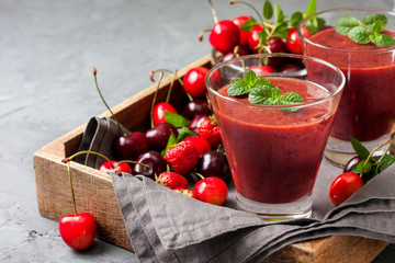 smoothie with cherry  in a glass