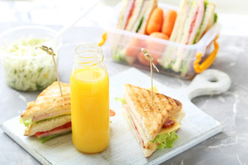 Canvas Print - Tasty and fresh sandwiches on a grey table