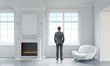 © ImageFlow - Businessman in living room