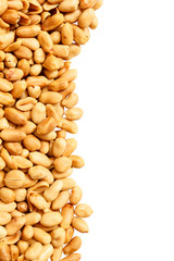 Wall Mural - Roasted peanuts isolated on white background