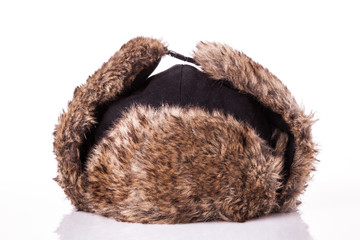 Fur cap for winter weather. Fur cap for winter isolated on white