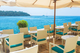 Fototapeta Niebo - a summer terrace seaside view of traditional european mediterran