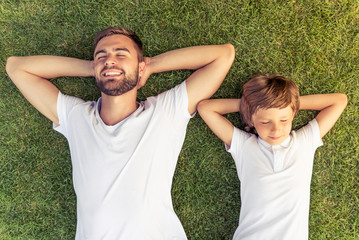 Dad and son resting outdoors