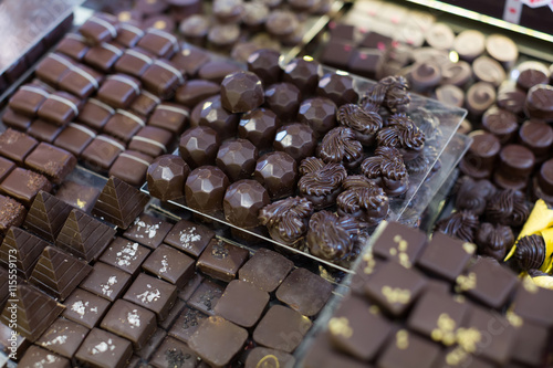 Obraz Dibond Collection of chocolates with different fillings at tea-room