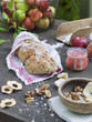 © FOLIO - Sweden, Bread, nuts, apple puree and fresh apples on wooden table
