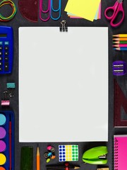 Wall Mural - Blank white paper with paper clip and frame of school supplies over a chalkboard background