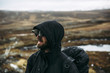 © FOLIO - Sweden, Sylama, Jamtland, Portrait of backpacker in hooded jacket