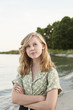 © FOLIO - Sweden, Blekinge, Hallevik, Portrait of teenage girl (16-17) standing on beach