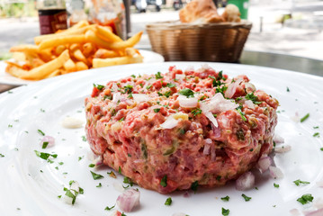 Sticker - tasty Steak tartare (Raw beef) - classic steak tartare on white