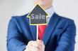 © twinsterphoto - Businessman offering house / real estate deal opportunities