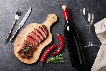 Wall Mural - Grilled striploin steak and wine