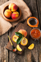 Poster - Peaches on a wooden background