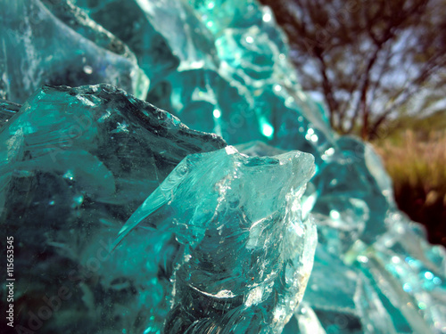 Fotografie, Obraz Sharp jagged broken blue glass macro texture