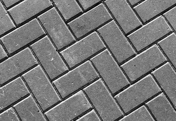 Horizontal vivid black and white street pavement textured backgr