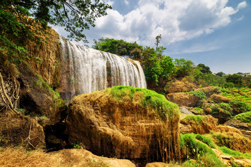 Sticker - Amazing view of waterfall with clear water among green woods