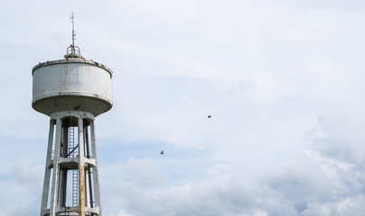 Water Tank Tower with cloud storm