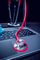 Stethoscope on laptop