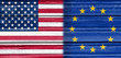 © JEGAS RA - Image relative to politic relationships between United States and European Union. National flags textured by wood.