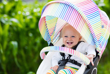 Baby In White Stroller