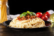 © George Dolgikh - Spaghetti bolognese on dark background