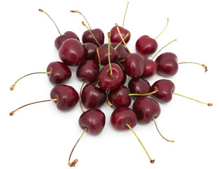 Wall Mural - red cherries on a white background