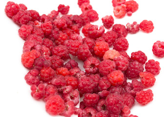 Wall Mural - Ripe raspberry on a white background