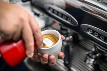 Wall Mural - Barista preparing proper cappuccino