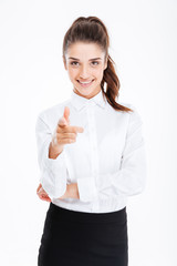 Sticker - Young smiling businesswoman pointing at camera