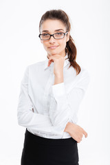 Sticker - Pensive pretty young businesswoman in glasses standing and thinking