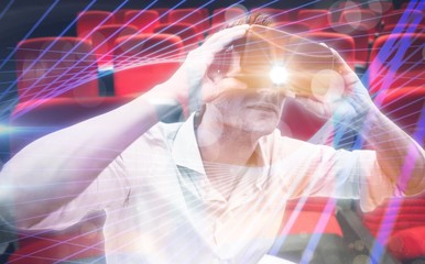 Poster - composite image of man using a virtual reality device