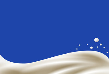 Wall Mural - milk splash on blue background