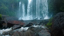 Veil Of White Water Tumbles Over The Brink Of A Natural Park At Phnom Kulen In Cambodia, With Sound. UltraHD Video