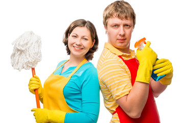 Housewife with a mop, and her husband, with spray in aprons