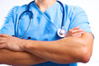 © lenetsnikolai - young surgeon standing with his arms crossed