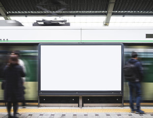 Blank Billboard Banner in Subway station with blur people 
