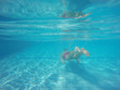 © vladstar - Beard man with glasses diving in a pool