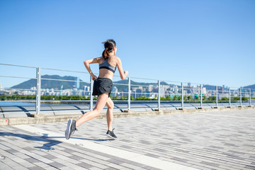 Wall Mural - Woman training on running